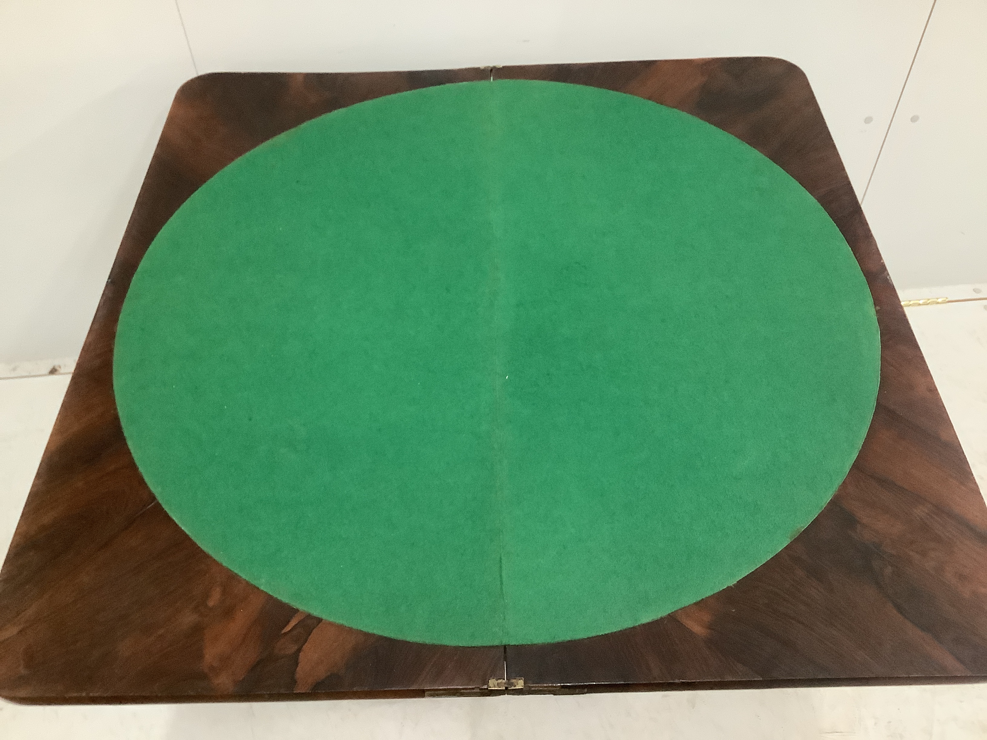 An early Victorian rectangular rosewood folding card table, width 92cm, depth 44cm, height 74cm